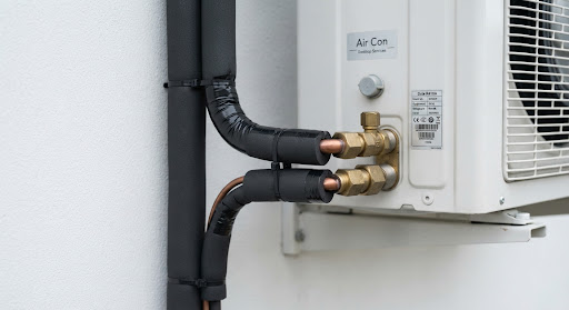 Copper refrigeration tube insulated with black nitrile foam connected with heavy duty brass flare fittings
